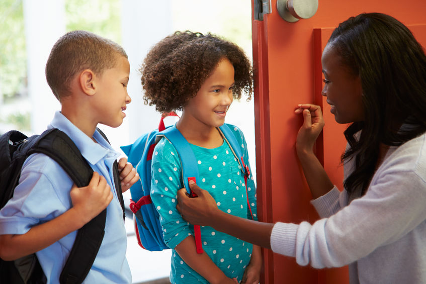Mother Saying Goodbye To Children As They Leave For School - school success resources